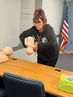 Rebecca Valandra of Fenton participates in Rock Community Fire Protection District’s CPR class. Rock Fire holds free CPR classes and first aid classes.
